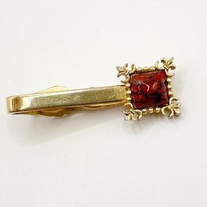 Swank vintage Mid century ornately framed red art glass tie clip gold tone